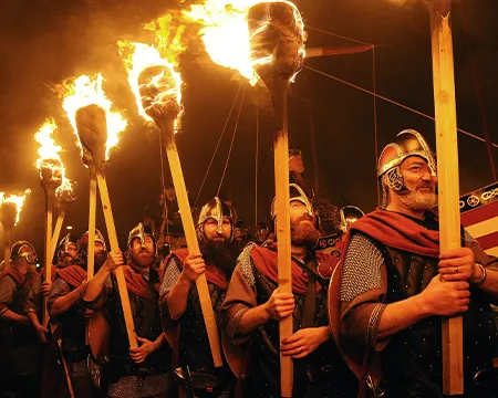 Vikings march the streets during Up Helly Aa in Lerwick
