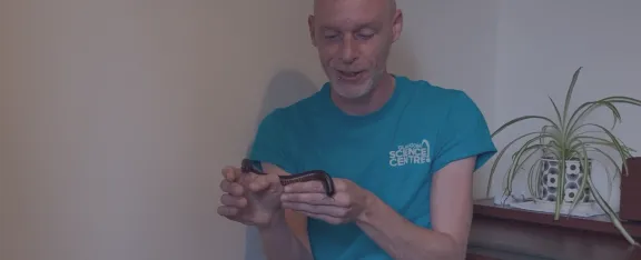 Presenter David holds a millipede