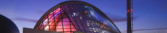 Glasgow Science Centre and Glasgow Tower lit up at night