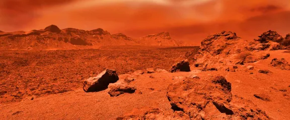 The orange, rocky surface of Mars