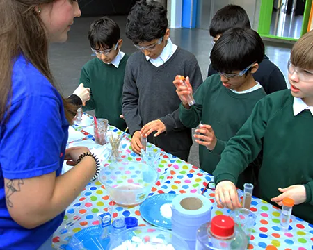 school children interact with a meet the expert and their activity