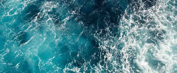 An aerial view of choppy seas